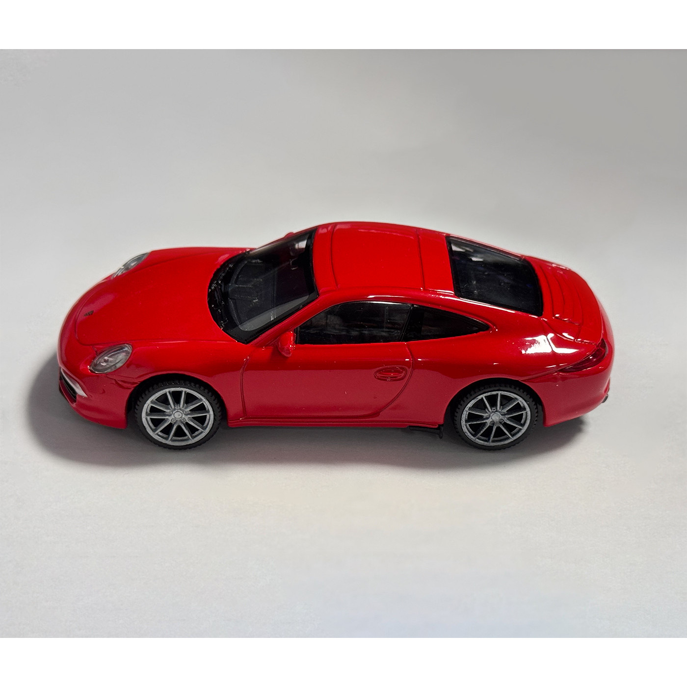 Model Porsche 911 Carrera S (měřítko 1:43, cca 10x4x3 cm