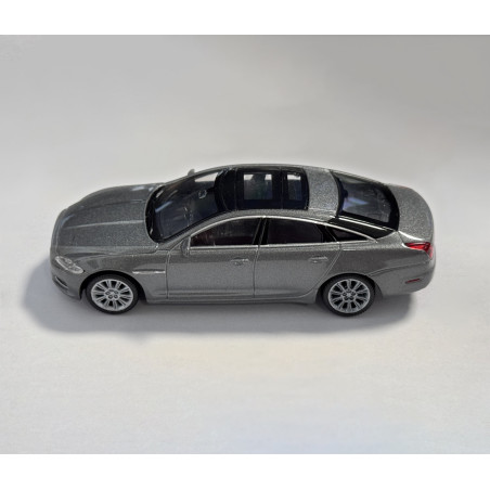 Scale model 2010 Jaguar XJ (scale 1:43, about 10x4x3 cm, gray)